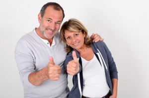 depositphotos_13940042-stock-photo-portrait-of-senior-couple-showing